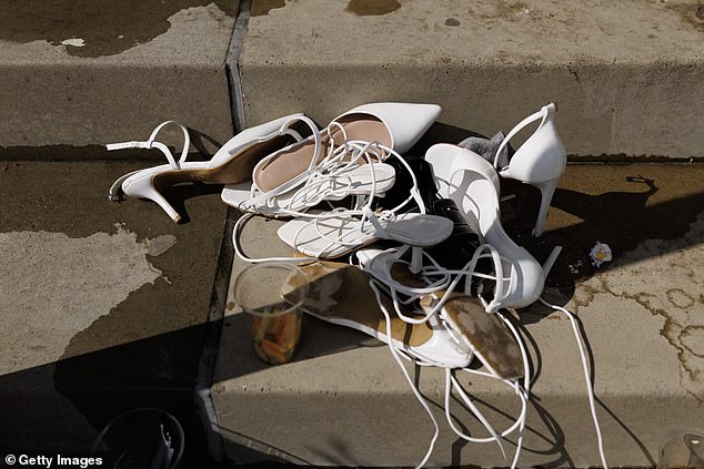 Shoe me the way to go home: A pair of high heels have been discarded at left at Epsom