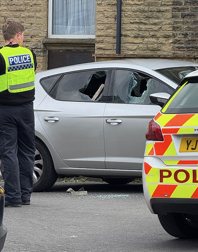 Footage from the scene shows smashed windows on a car after a brawl in the Newton Street area