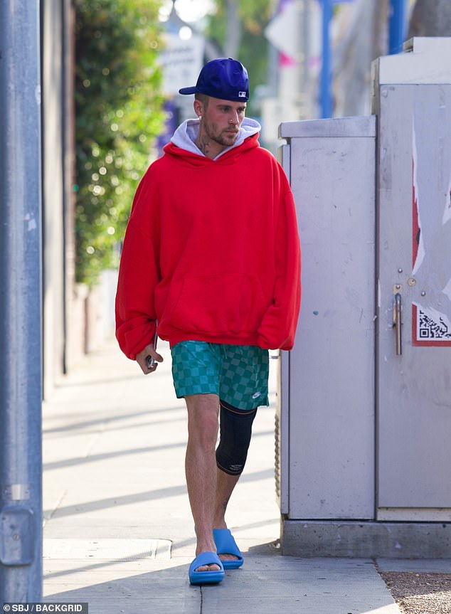 The singer, 31, who sparked concern with an online rant earlier this week, cut a slighter figure and sported a knee brace on his left leg as he headed to a spa