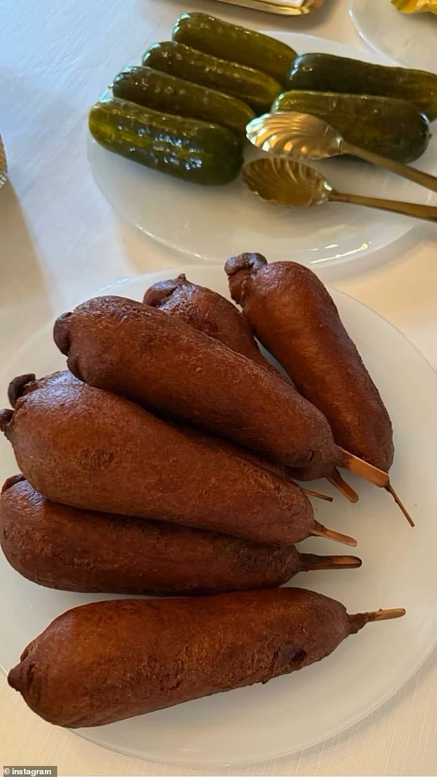 They later built up an appetite and one picture was taken to show a pile of corndogs and pickles on a table