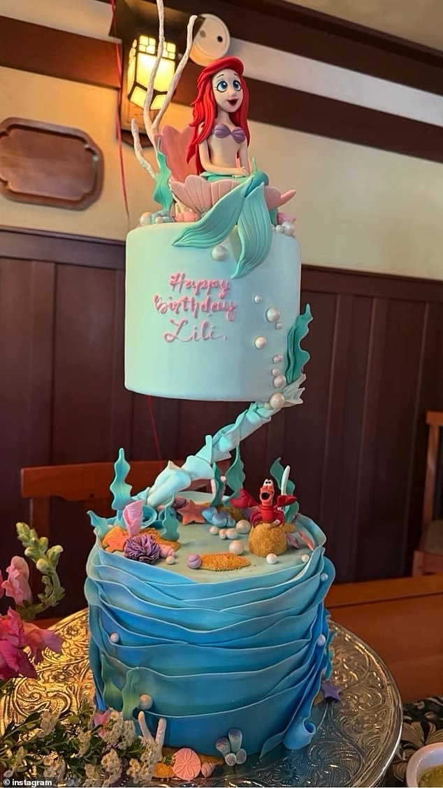 Lillibet also received a Little Mermaid-themed cake that was covered in hues of blue sugary frosting while 'Happy Birthday Lili' was written in pink icing
