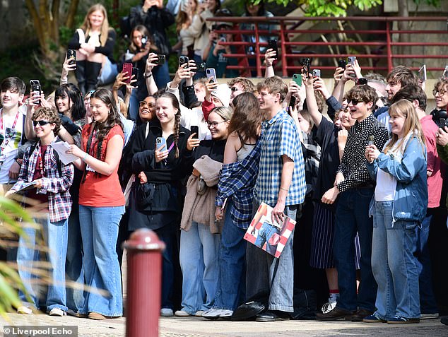 A large crowd of students gathered outside the venue, eagerly waiting for Sir Paul's autograph