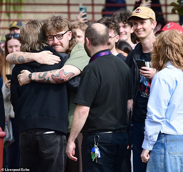 One fan looked visibly emotional as he greeted Sir Paul with a warm hug
