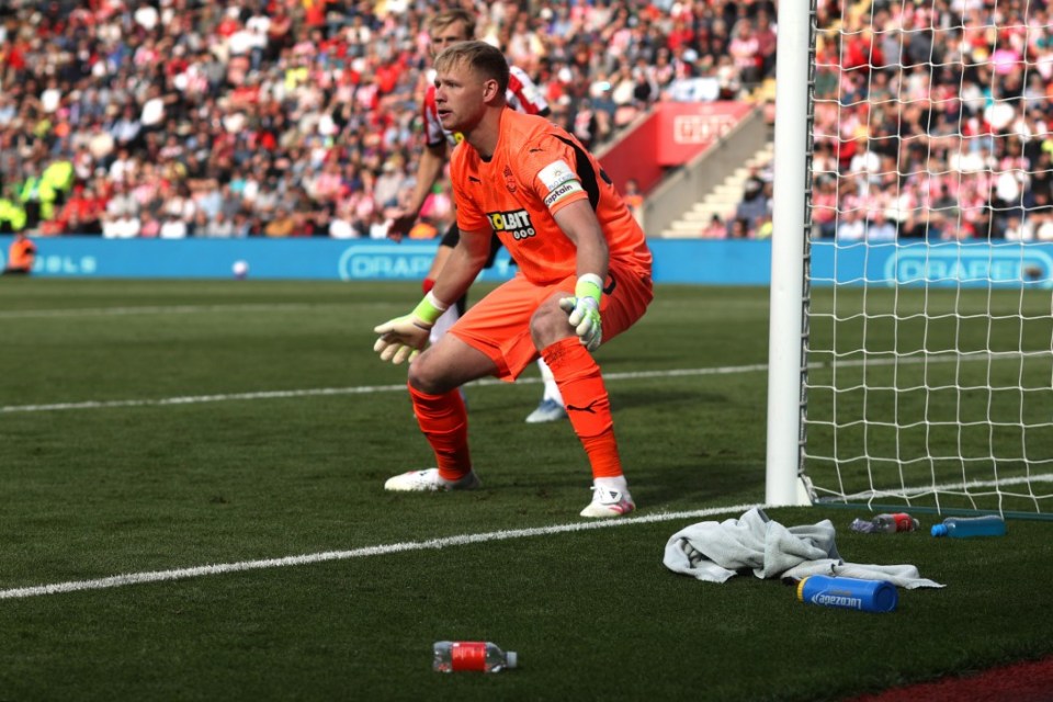 SOUTHAMPTON, ENGLAND - MAY 25: Southampton goalkeeper Aaron Ramsdale guards his goal with various discarded bottles and a towel near his near post during the Premier League match between Southampton FC and Arsenal FC at St Mary's Stadium on May 25, 2025 in Southampton, England. (Photo by Mark Leech/Offside/Offside via Getty Images)