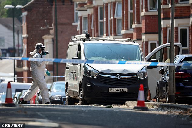 The attack saw Calocane stab Barnaby and Grace in the street before stabbing Ian Coates and stealing his van (Pictured: the scene after Calocane was stopped by police)