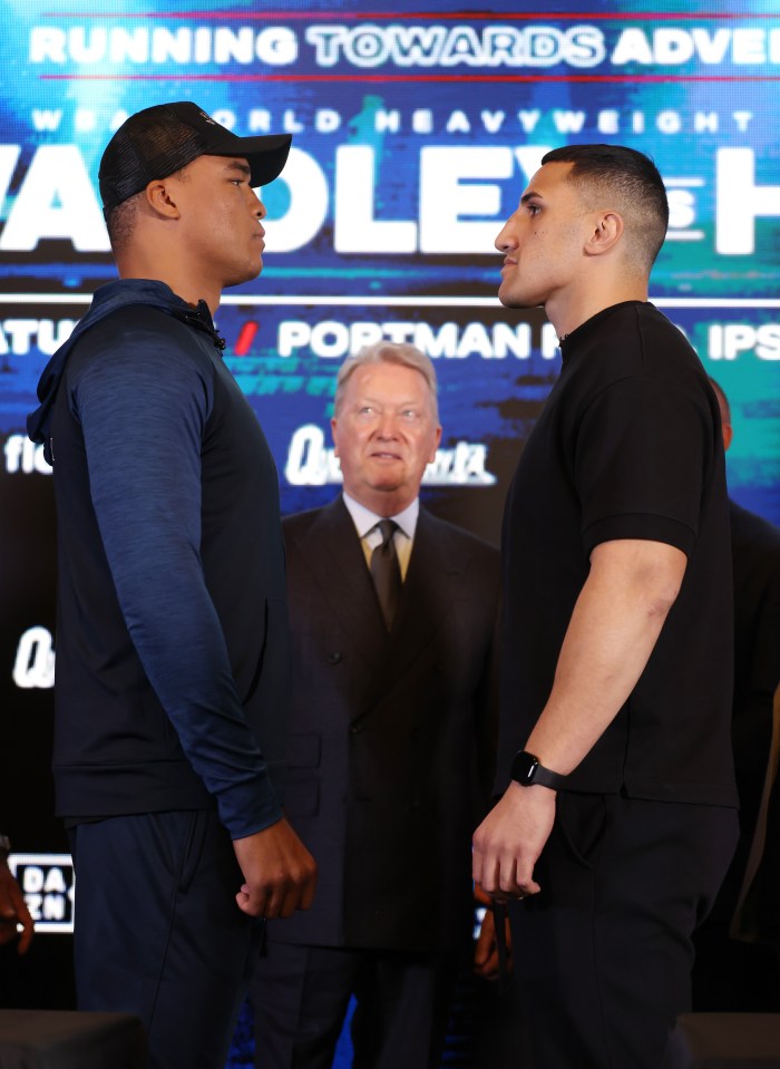 Justis Huni and Fabio Wardley facing off at a press conference.