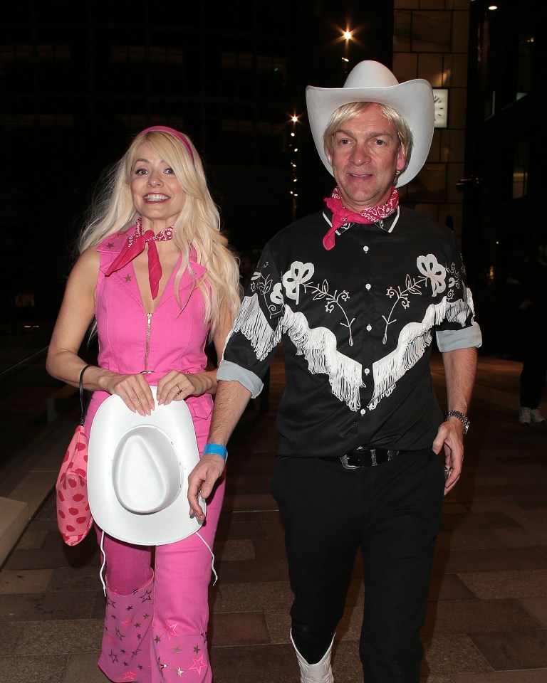 Holly Willoughby and Dan Baldwin at a party.