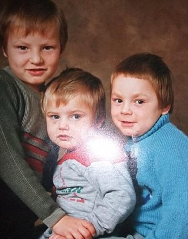 Levan (pictured left, far right) with his brothers Lloyd, who was four at the time of the incident, and older brother Clint, who was eight, is now a father of two children