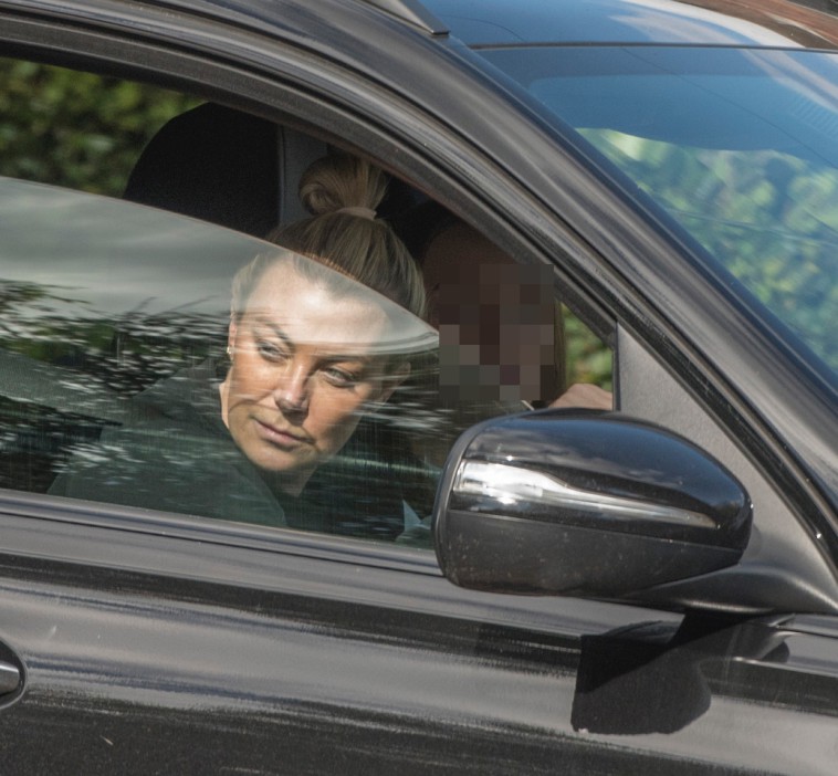 Pictures by Andrew Styczynski.Epping Essex. Billi Mucklow with her daughter in passenger seat leaving their Essex mansion.