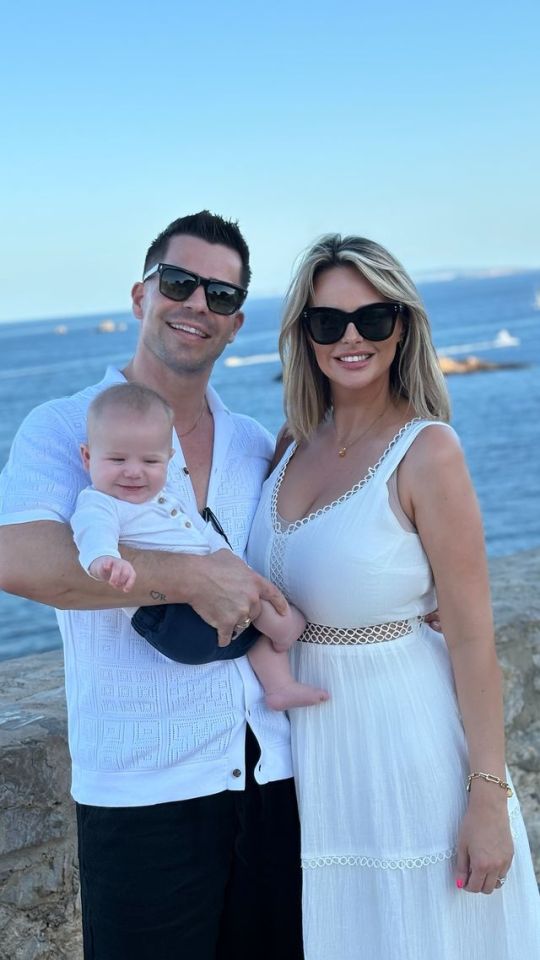 Family portrait by the ocean.