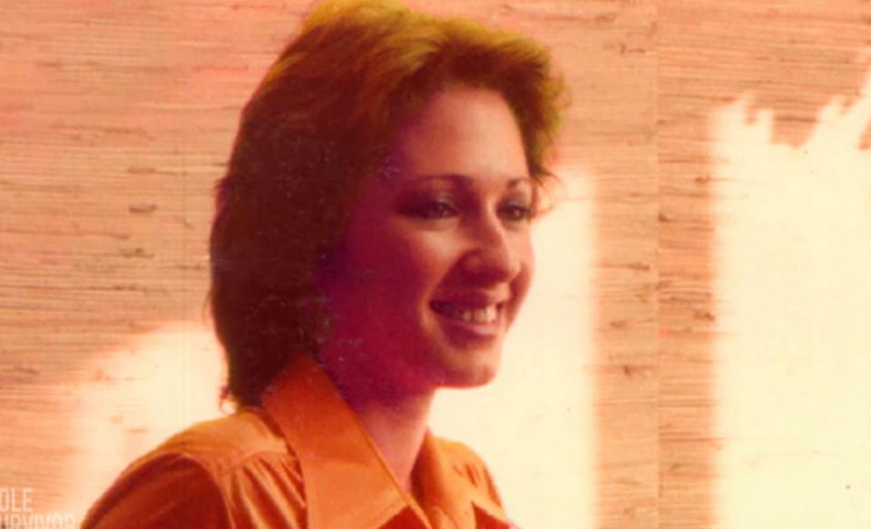 Photo of Lisa smiling.