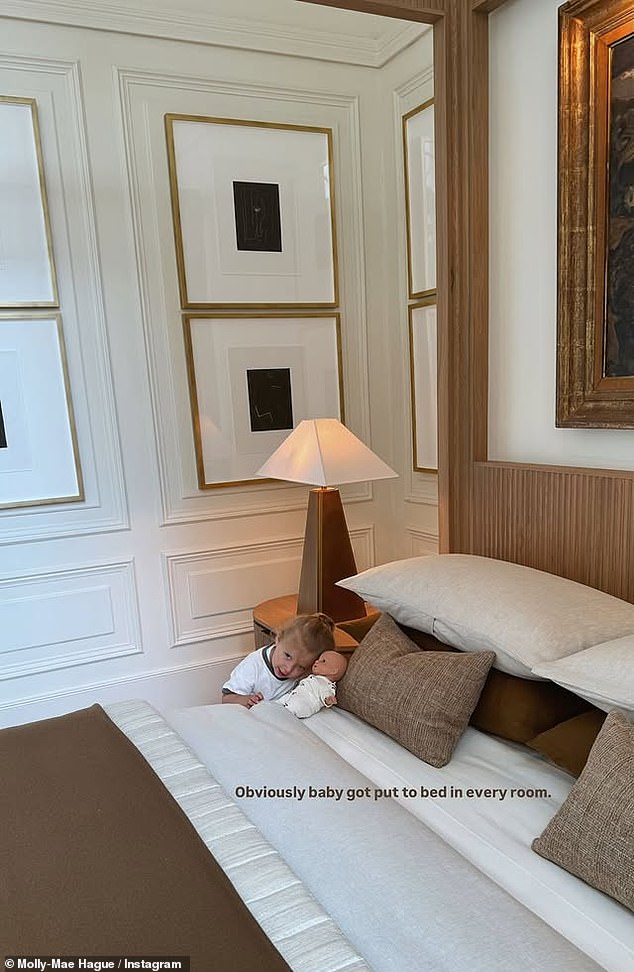 Another adorable snap saw Bambi putting her toy baby to bed in the huge king sized master bedroom