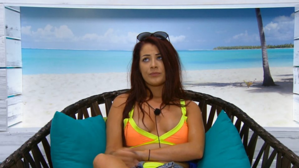 Jess from Love Island sitting on a wicker chair.