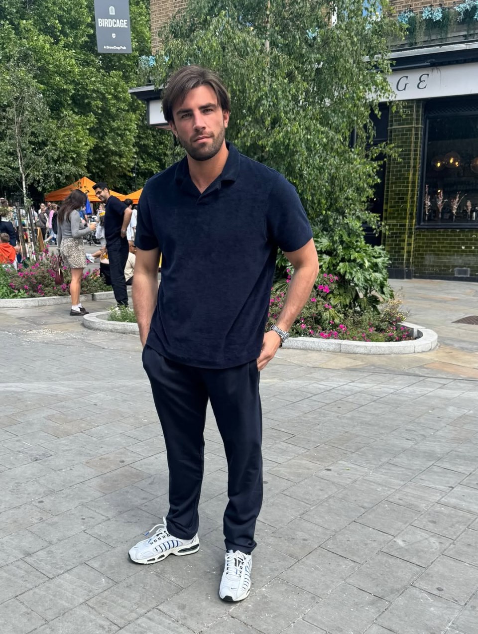 Jack Fincham standing outside a pub.
