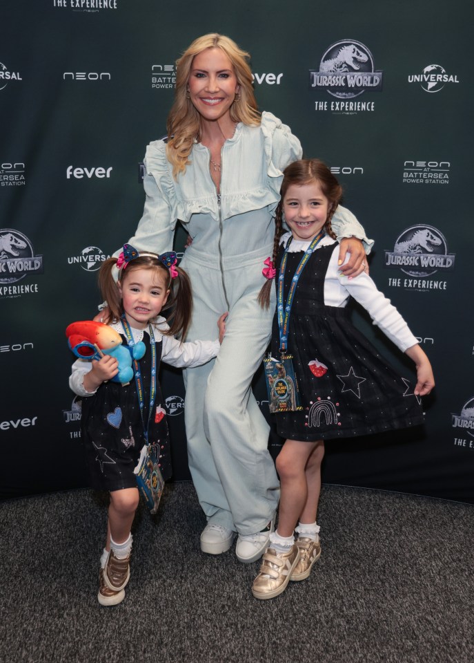 Carrie Johnson with her two daughters at the Jurassic World: The Experience launch.