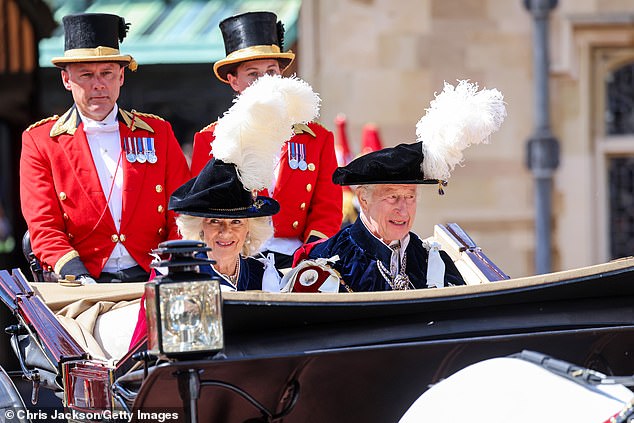 Charles (right) travelled with Queen Camilla (left) in a carriage at last year's parade to be safer and more comfortable