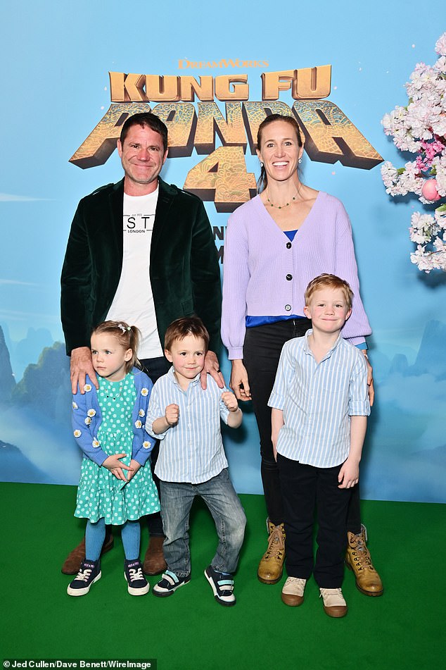 The host of BBC's Deadly 60, who is married to Olympic champion rower Helen Glover, admits that having three young children while in his 50s is physically draining (famly pictured together last year)