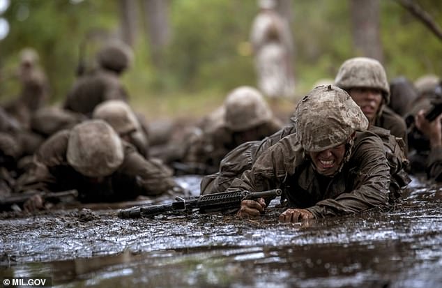 Hundreds of rookie commandos were ordered to do the Marines¿ ¿mud run¿ after only a dozen or so fellow recruits were caught pilfering the camp¿s canteen