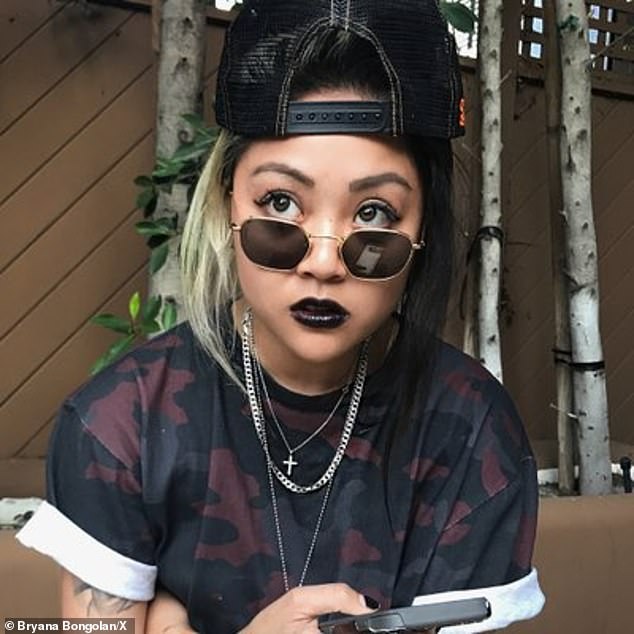 Bongolan (pictured) claimed the rap mogul had held her over the edge of a balcony, 17 stories high