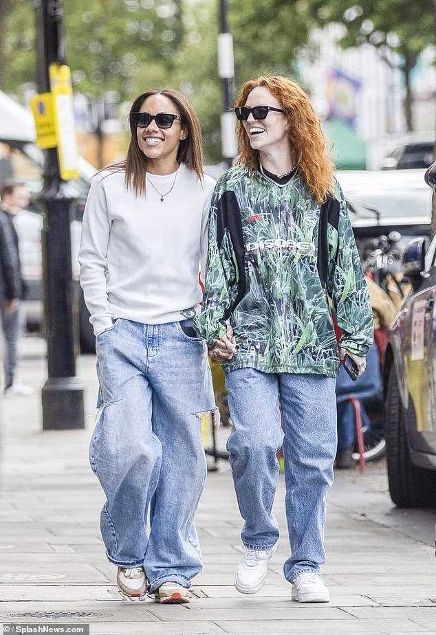 The singer, 35, and her ex-footballer girlfriend, 40, looked incredible as they were spotted laughing the day away while enjoying a walk around the capital city