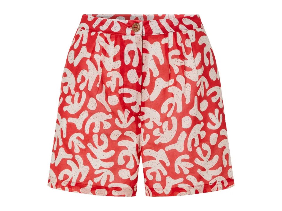 Red shorts with a white abstract pattern.