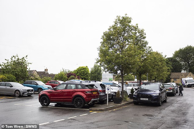 Despite the hefty fee of £640 residents can't park their vehicles outside their homes and claim the town is used as a 'car park'