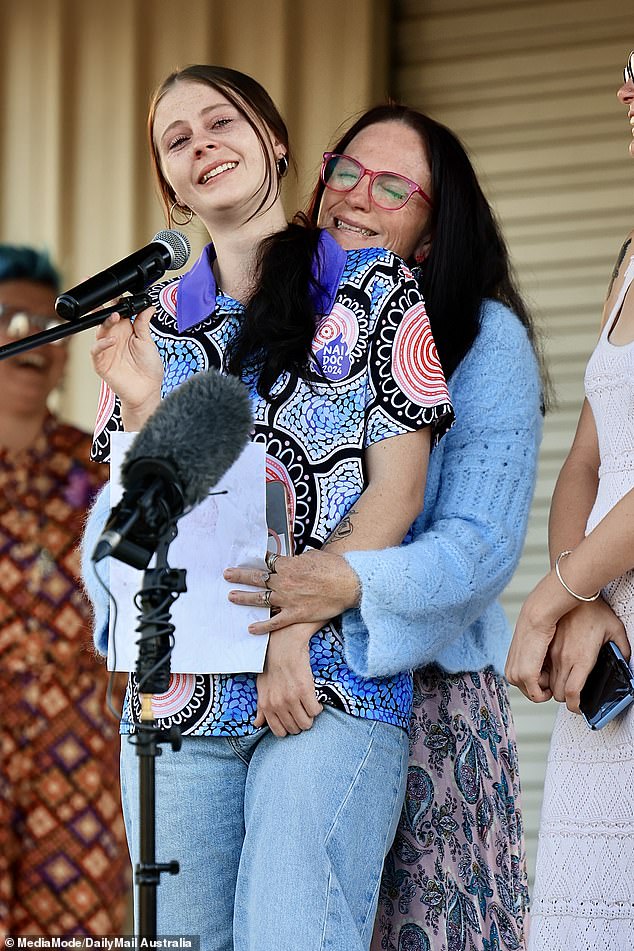 Kylie held her daughter Kaylea as she shared a powerful speech in honour of her sister