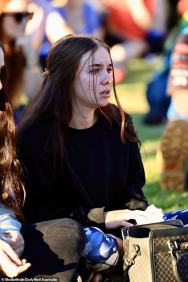 Onlookers broke down in tears during the emotional candlelit vigil