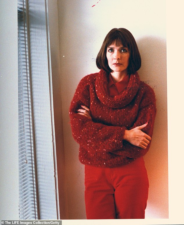 Laurie is seen posing by a window in her parents' house where she stayed after her murder conviction was reduced