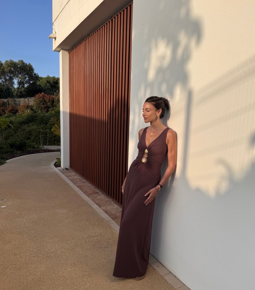Michelle Keegan in a brown maxi dress.