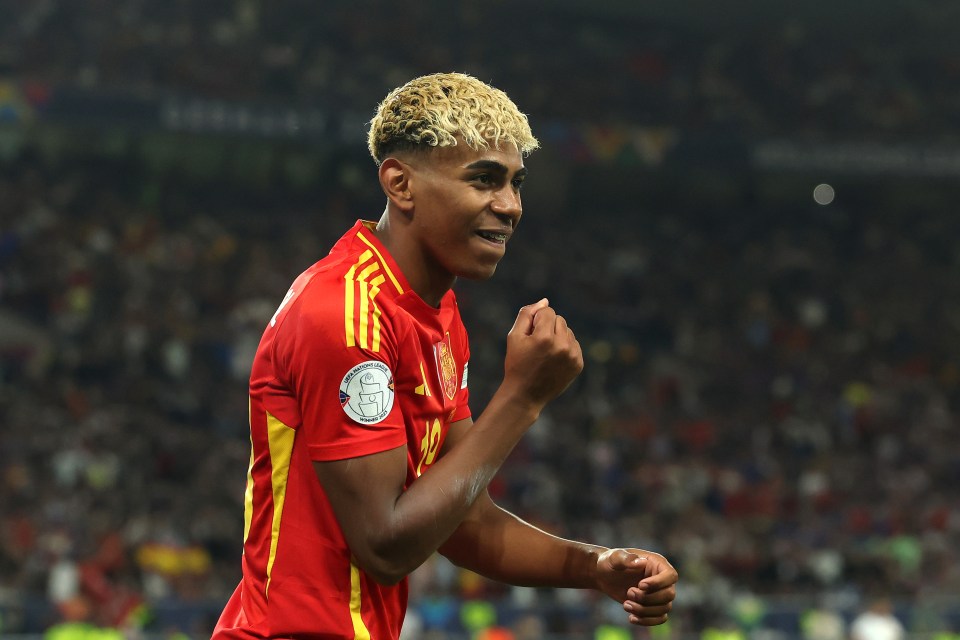 Lamine Yamal of Spain celebrating during a soccer match.