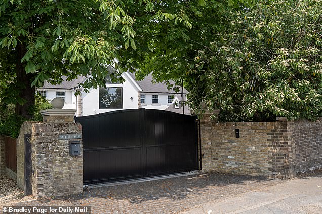 A resident nearby said the finished works have left the house too large for its plot - and strict repercussions should be carried out for any planning breaches