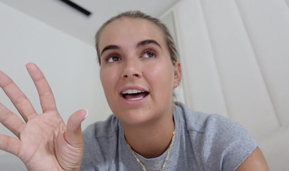 Close-up of a woman talking to the camera.
