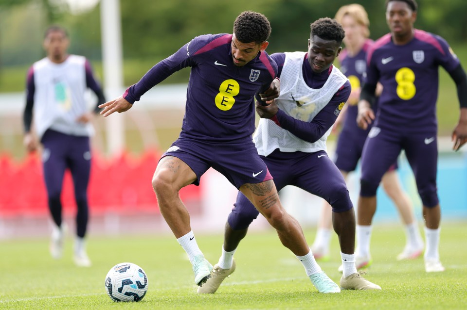 Morgan Gibbs-White and Bukayo Saka of England in a training session.