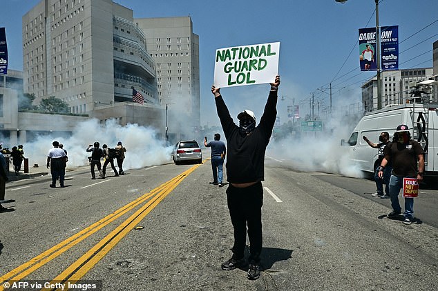 'These lawless riots only strengthen our resolve', Trump said as images emerge of troops on the ground in the downtown area of the city ready to defend the city from more violent demonstrations