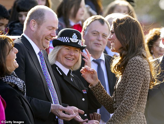 The devoted Princess of Wales normally carries out over a hundred engagements per year whilst parenting her three children. She is pictured on a school visit in Oxford in 2012