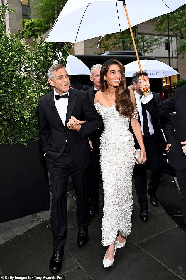 Amal stole the show in her pearl frock, paired with white heels and a structured clutch