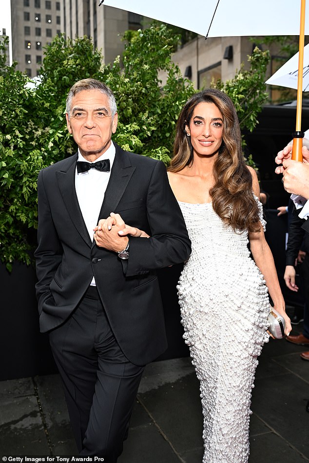 George Clooney looked dapper in his suit, joined by his stunning wife Amal