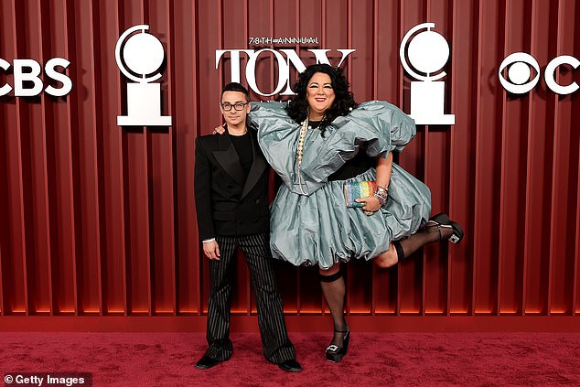 Christian Siriano rocked black and white pinstripe trousers with a black blazer and top and Ashley Longshore donned a voluminous look