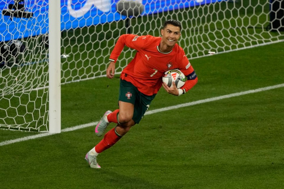 Portugal's Cristiano Ronaldo celebrates after scoring his side's second goal against Spain during the Nations League final soccer match between Portugal and Spain at the Allianz Arena in Munich, Germany, Sunday, June 8, 2025. (AP Photo/Michael Probst)