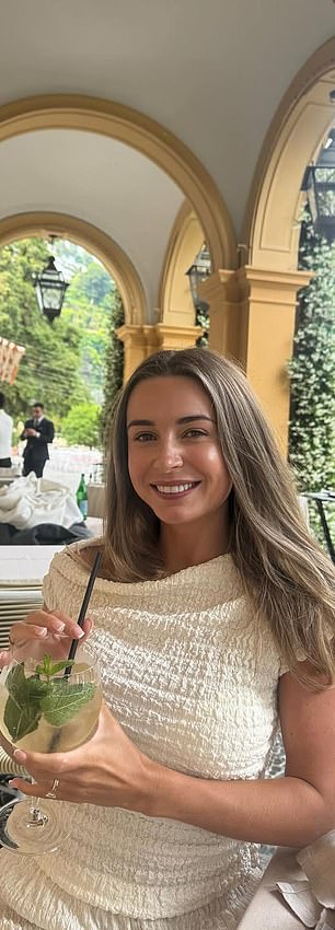 Dani looked radiant as she posed in a gorgeous one-shouldered cream dress while enjoying a cocktail
