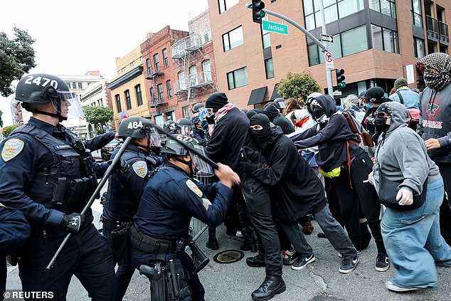 Police in riot gear clashed with protesters in San Francisco on Sunday