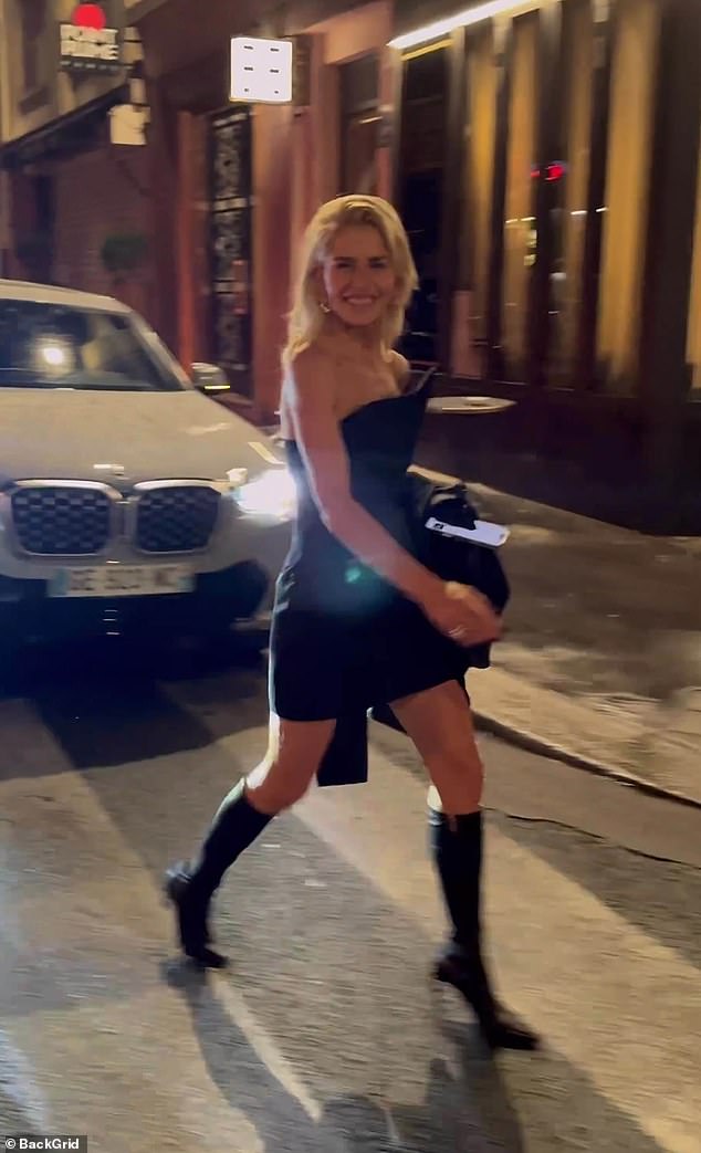 Caroline appeared in great spirits as she flashed a dazzling smile during the late night outing