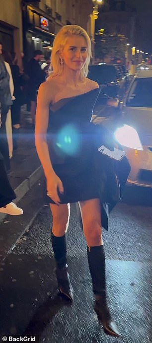 Meanwhile, Caroline dressed to impress in a strapless little black dress teamed with knee-high black boots