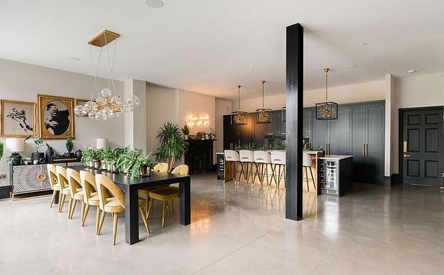 The open plan kitchen and dining area is the perfect space to stage dinner parties within