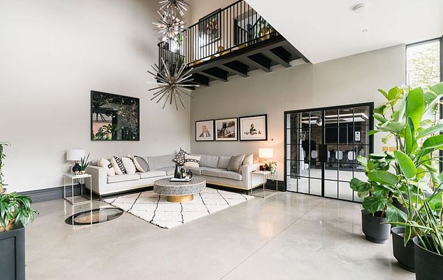 DJ Spoony has spent years renovation the property, which has a first floor gym accessed by a separate staircase and stands alongside a mezzanine balcony overlooking the sitting room