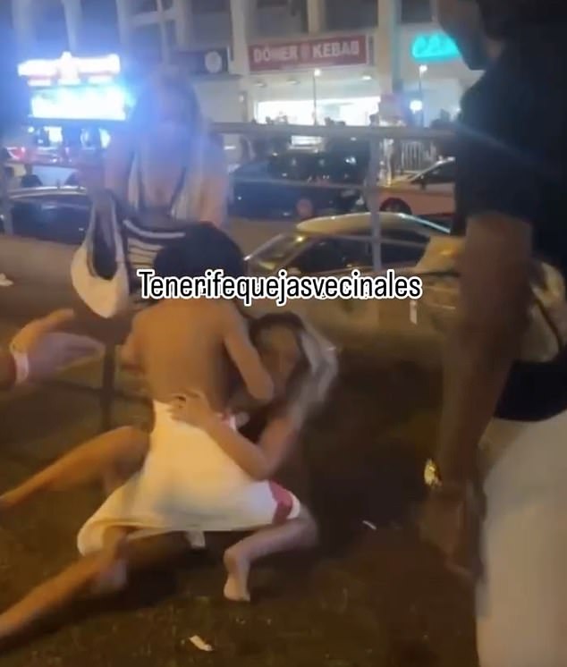 The alarming moment two British women came to blows in the street of a popular Tenerife nightspot was caught on camera - sparking fury from locals