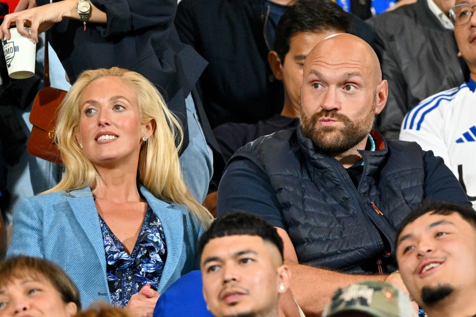 Paris and Tyson Fury at a soccer match.
