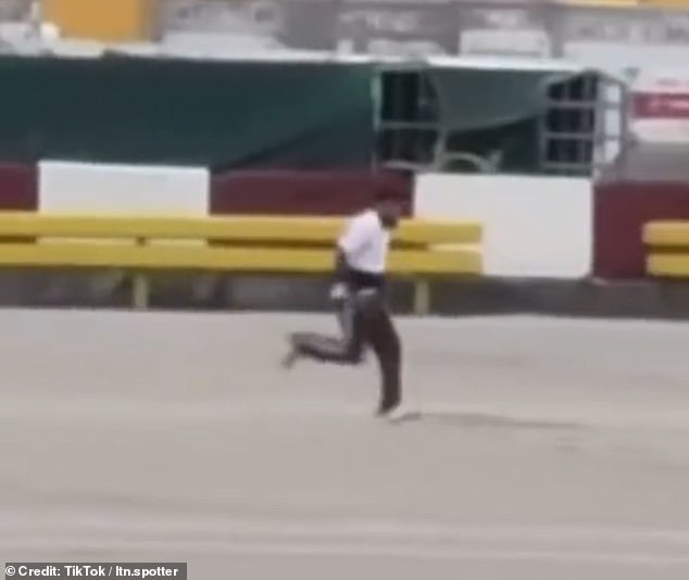 He manages to get away from his chasers as he heads towards the runway
