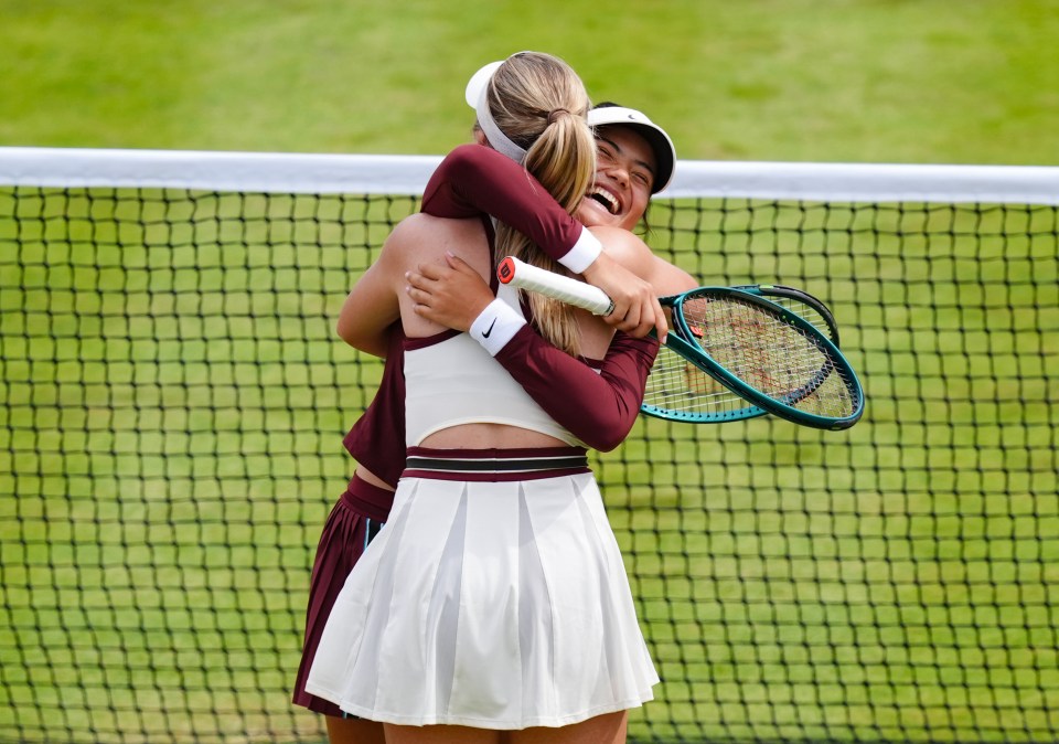 Katie Boulter and Emma Raducanu celebrating a tennis match victory.
